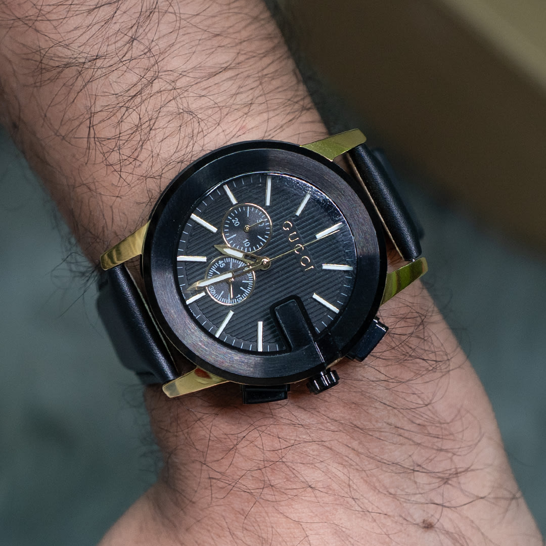 Bold Gucci G-Chrono Black and Gold Chronograph Watch