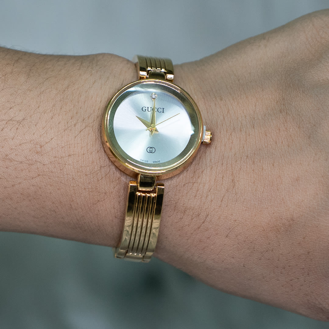 Elegant Gucci G-Timeless Gold-Tone Ladies Watch